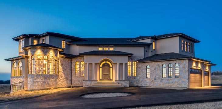 OUter view custom home at night